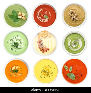 Different tasty soups in bowls isolated on white, collage. Top view Stock Photo