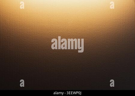 Warm gold-to-brown gradient textured background with subtle vertical pattern and soft ambient lighting, ideal for design backdrops, mood settings, min Stock Photo