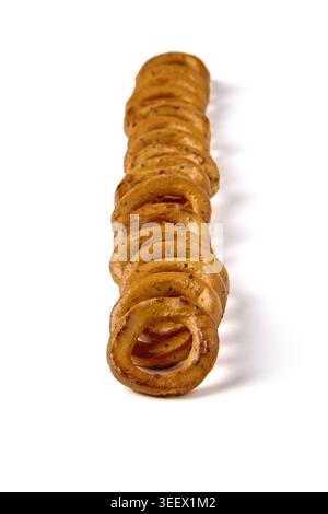 Salted pretzels with poppy seeds lined up in a row isolated on a white background. Stock Photo