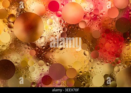Warm Lighting Enhances Luxurious Design Featuring Floating Oil Droplets And Decorative Patterns Stock Photo