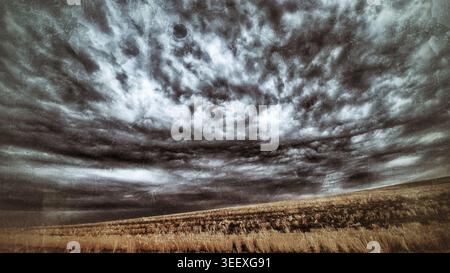 Churning Heavens Over the Quiet Earth Stock Photo