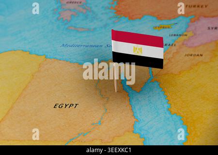 Egypt flag pin marking Egypt on Africa map, travel destination concept Stock Photo