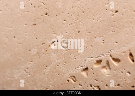Natural travertine stone background, close up Stock Photo