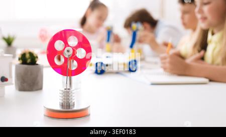 Students Engaged in Hands On Science Project Focusing on Physics Concepts at a Classroom Setting Stock Photo