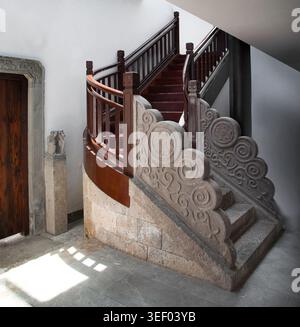 Architectural detail stone stairs, wooden balustrade, China Stock Photo