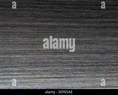 Horizontal Brushed Steel Texture In Closeup, Sleek Gray Surface With Fine Grain And Faint Linear Scratches, Subtle Gradient Lighting Creating Soft Hig Stock Photo