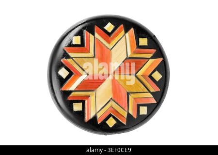 Vintage wooden round brooch isolated on white background Stock Photo