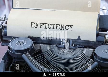 Efficiency symbol. Concept word Efficiency typed on beautiful old retro ...