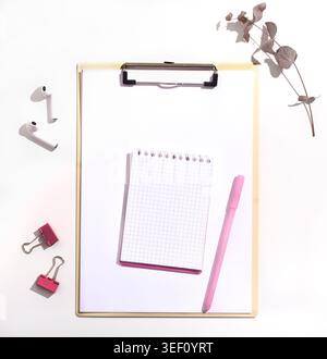 Notepad with blank space and pink pen on white background Stock Photo
