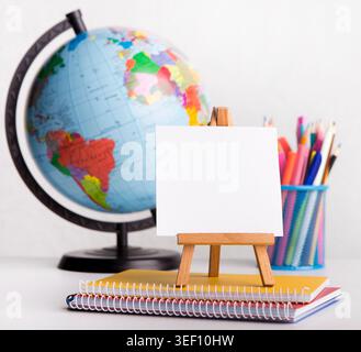 Close up of modern easel with white sheet of paper Stock Photo