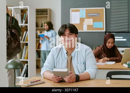 Portrait of Asian Student Studying in Migrant Education Center Stock Photo