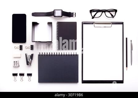 Set of office supplies with watches and glasses on background Stock Photo