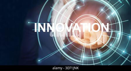 Businessman pushing button on blank virtual screen Stock Photo