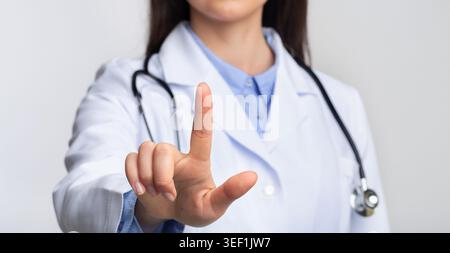 Doctor Using Invisible Medical Touchscreen Pressing Button, Cropped, Panorama Stock Photo