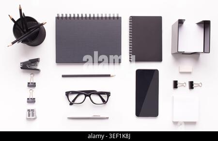 Stylish Office stationery and cellphone with blank space on table Stock Photo