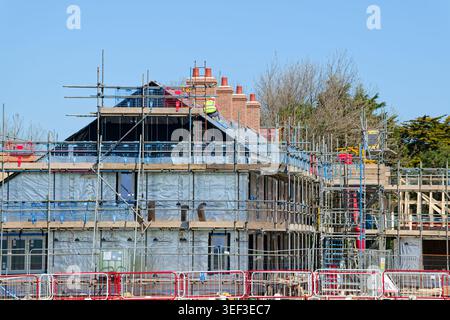 New housing development, built by Macar close to the seafront in Rustington, West Sussex, England, UK. 2026 new houses construction with scaffolding. Stock Photo