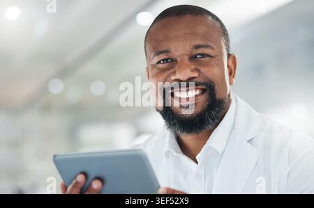 Tablet, smile and portrait of scientist in laboratory for chemistry research, report or test results. Medical analysis, tech and mature black man with Stock Photo