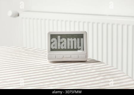 Programmable Thermostat for Home Heating and Cooling Control Stock Photo