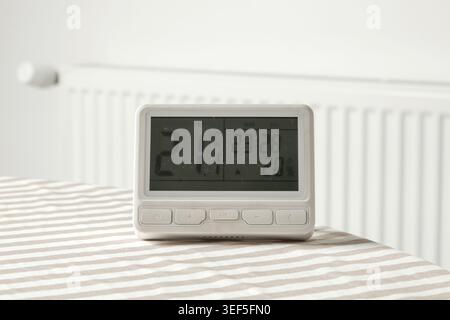 Programmable Thermostat for Home Heating and Cooling Control Stock Photo