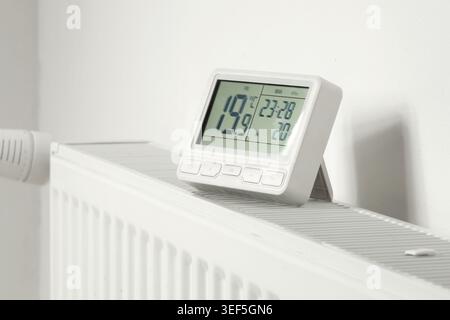 Programmable Thermostat for Home Heating and Cooling Control Stock Photo