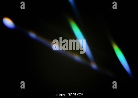 Colorful light creating spectrum effect on dark background Stock Photo