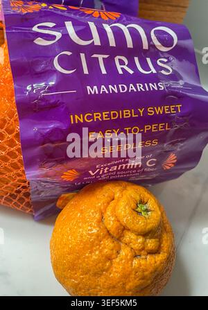 Close-up of a single sumo citrus  and bag from California, 2026, United States Stock Photo