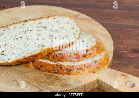 Multigrain bread on a wooden background Stock Photo