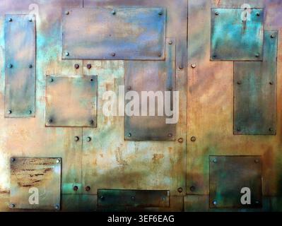Rusty metal plates with rivets creating an abstract industrial background, showcasing weathered textures and the effects of patina and corrosion on di Stock Photo