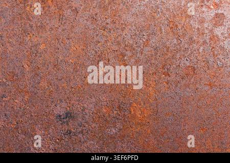 rusty iron metal background with red orange color and pitting and corrosion Stock Photo