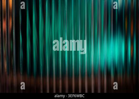 Emerald green and cyan abstract light refractions on ribbed glass Stock Photo
