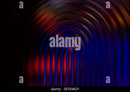 Deep blue and red abstract glowing arching light lines Stock Photo