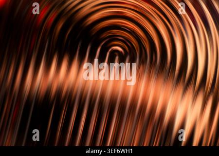 Copper and bronze abstract glowing circular motion blur texture Stock Photo