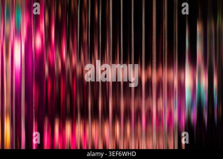 Deep magenta and red vertical abstract lines with a smooth glowing dark texture Stock Photo