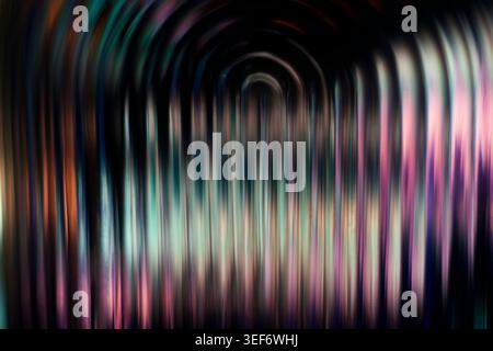 Abstract glowing neon blue and pink concentric arches with vertical ribbed glass texture Stock Photo