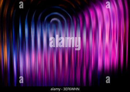 Vibrant neon purple and blue abstract concentric arches melting into vertical blurred stripes Stock Photo