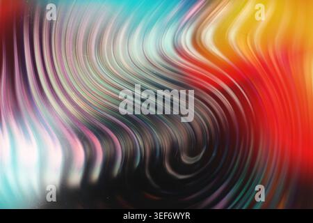 Colorful liquid gradient ripples blending cyan magenta and yellow with film grain Stock Photo