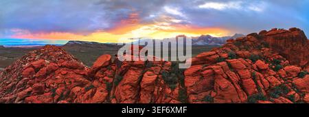 Aerial Red Rock Calico Hills Panorama With Snowy Mountains at Sunset Nevada Stock Photo