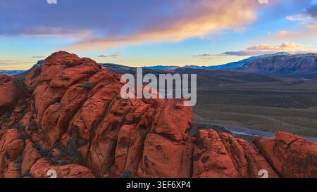 Aerial Red Rock Canyon Sunset Over Calico Hills and Snowy Nevada Mountains Stock Photo