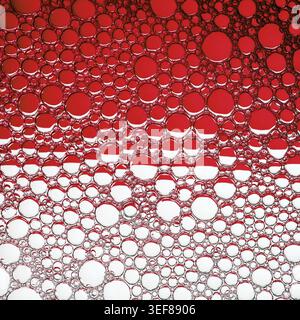 Abstract red bubbles background. Foam bubbles macro texture Stock Photo