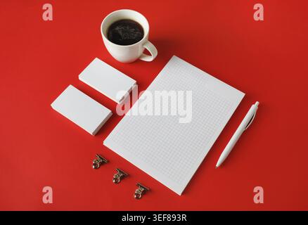 Blank stationery set on red paper background. Corporate identity template. Responsive design mockup Stock Photo