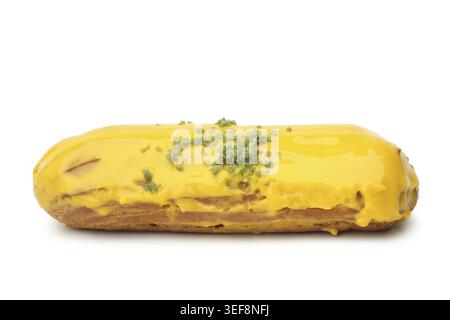 Eclair with mango cream on white background Stock Photo
