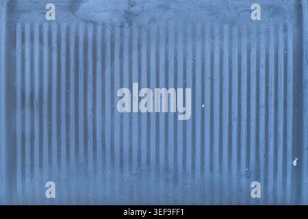 Cold blue frosted glass texture background with frozen vertical lines Stock Photo