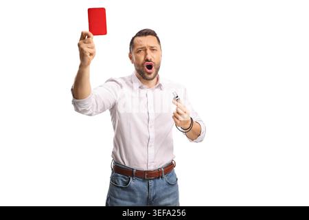 Angry man in white shirt holding a red card and a whistle isolated on white background Stock Photo
