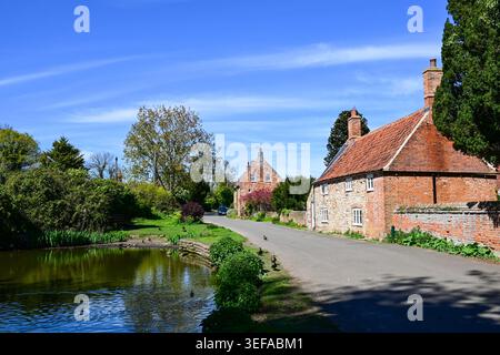 Old Hunstanton village with pond and cottages, Norfolk, England, UK Stock Photo