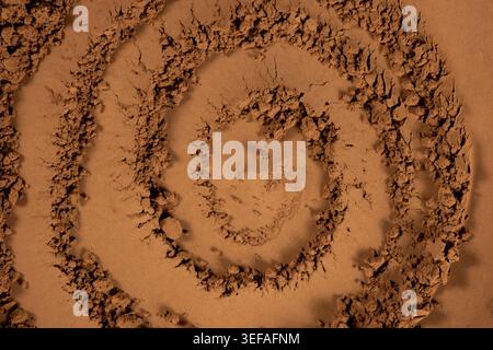 Top view of aromatic cocoa powder with artistic swirls and patterns Stock Photo