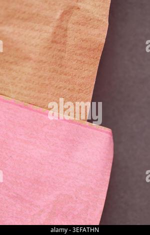 Minimal layered paper composition featuring warm brown and soft pink handmade paper textures. Modern abstract background ideal for branding and contem Stock Photo