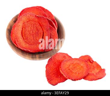 Crispy roasted carrot chips with sea salt, isolated on white background. Healthy and crunchy natural vegetable snack. Clipping path Stock Photo