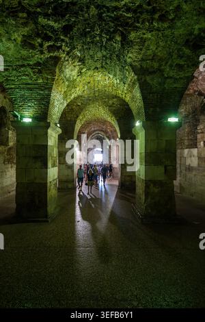 Exploring the ancient cellars at Diocletians Palace in Split Croatia Stock Photo