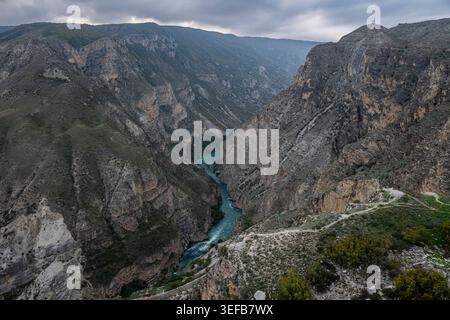 Mountain landscape with river in Dagestan, Russia during cloudy weather Stock Photo