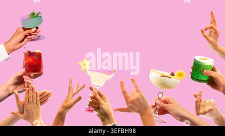Colorful cocktails and hands cheering on pink background with copy space. Stock Photo